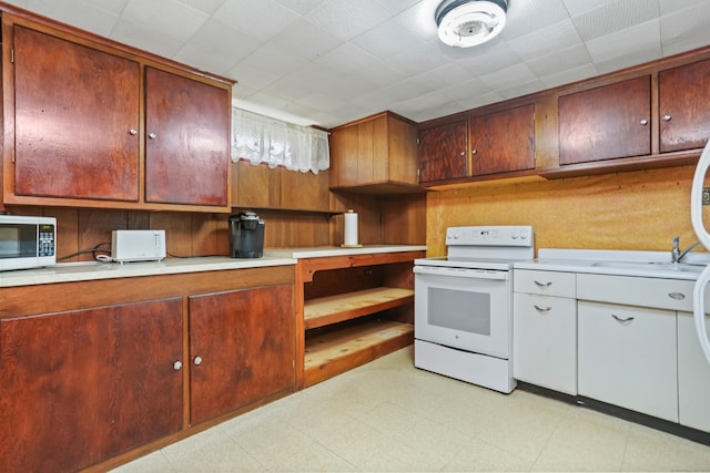 97 Travis Dr, Bridgeport, CT 06606 - kitchen featuring white appliances, light countertops, and light flooring