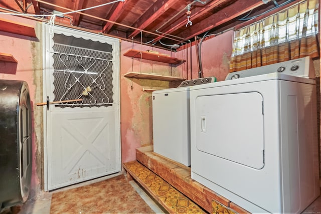 97 Travis Dr, Bridgeport, CT 06606 - laundry area featuring washer and dryer and oil tank