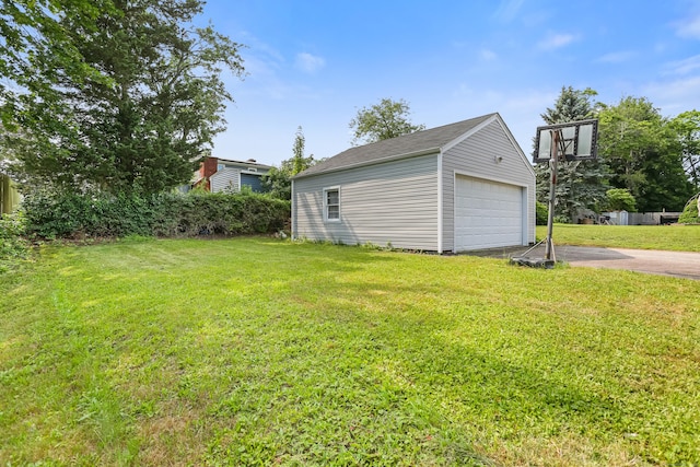 97 Travis Dr, Bridgeport, CT 06606 - view of green lawn featuring an outbuilding and a detached garage