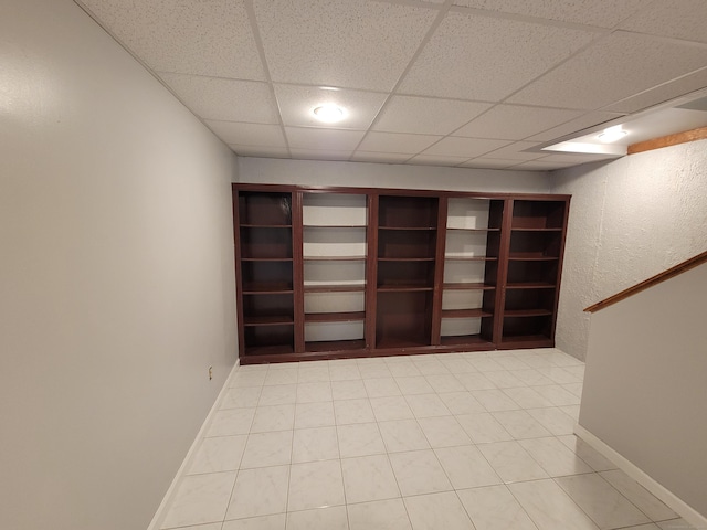 12 Enrico Rd, Bolton, CT 06043 - unfurnished room with a paneled ceiling and light tile patterned floors