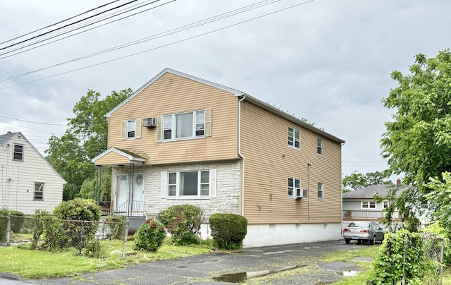 view of front of home featuring stone siding