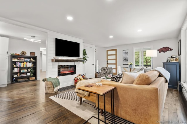 1207 Stillson Rd, Fairfield, CT 06824 - living area with a large fireplace, wood finished floors, and recessed lighting