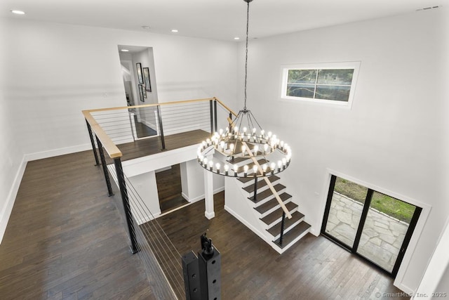 1207 Stillson Rd, Fairfield, CT 06824 - staircase with a chandelier, wood finished floors, and recessed lighting