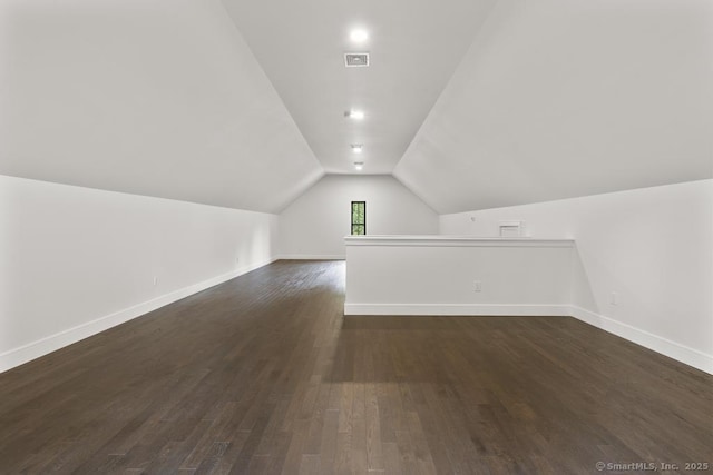 1207 Stillson Rd, Fairfield, CT 06824 - bonus room with dark wood-style floors and lofted ceiling