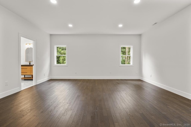 1207 Stillson Rd, Fairfield, CT 06824 - spare room with dark wood-type flooring, plenty of natural light, and recessed lighting