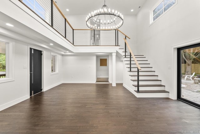 1207 Stillson Rd, Fairfield, CT 06824 - foyer featuring a high ceiling, stairs, a chandelier, wood finished floors, and recessed lighting