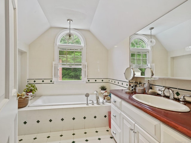 33 Great Pasture Rd, Redding, CT 06896 - bathroom with vanity, vaulted ceiling, a garden tub, plenty of natural light, and tile patterned floors