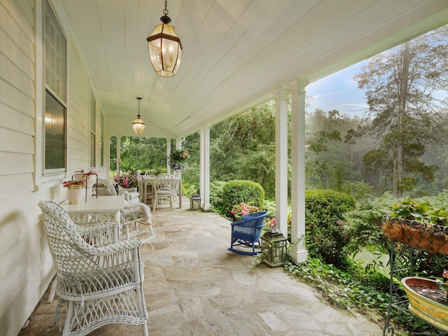 33 Great Pasture Rd, Redding, CT 06896 - porch featuring outdoor dining area and a patio area