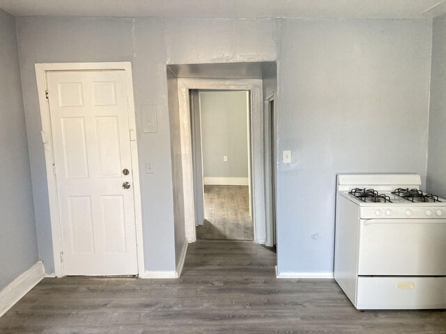 34 Park St, Bridgeport, CT 06608 - kitchen with white gas range oven and wood finished floors