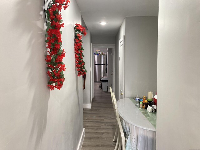 34 Park St, Bridgeport, CT 06608 - hallway with wood finished floors and baseboards