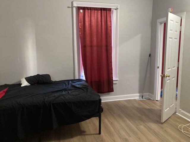 34 Park St, Bridgeport, CT 06608 - bedroom with light wood-style flooring