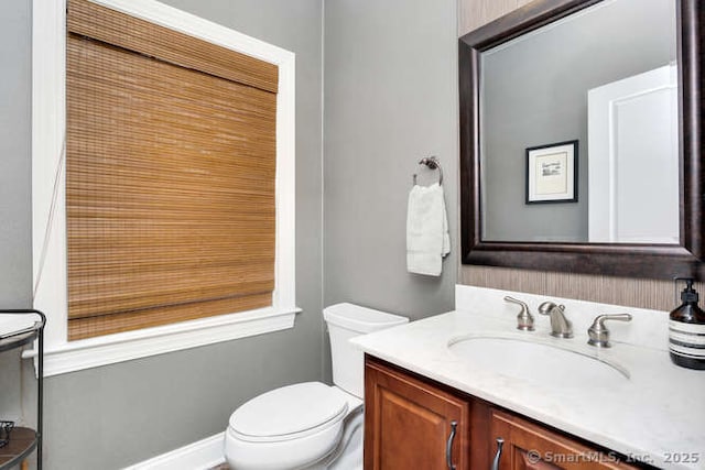 24 Nimitz Pl, Greenwich, CT 06870 - half bathroom featuring toilet and vanity