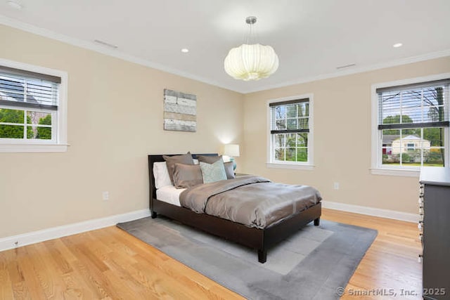 24 Nimitz Pl, Greenwich, CT 06870 - bedroom with ornamental molding, light wood finished floors, and recessed lighting
