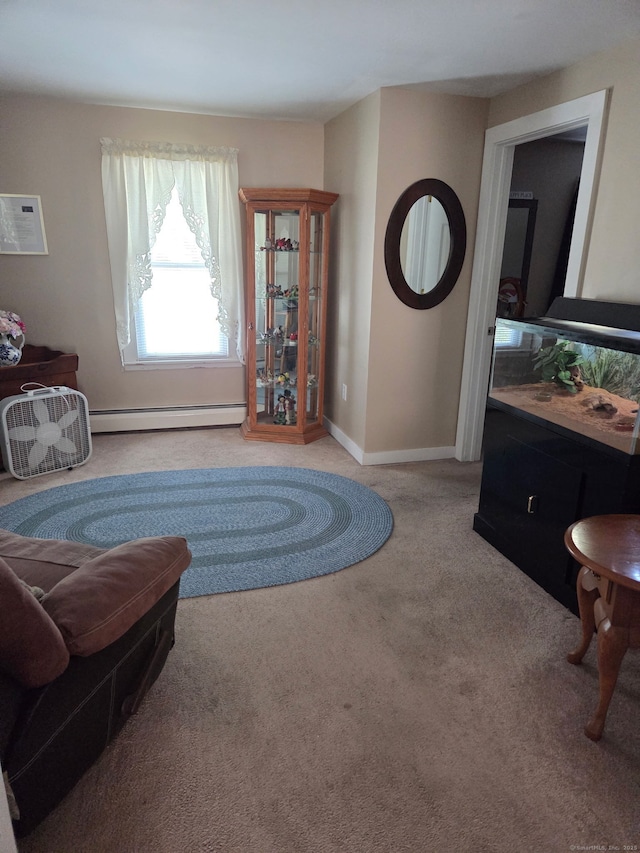 138 Harwinton Ave, Torrington, CT 06790 - carpeted living area featuring a baseboard heating unit
