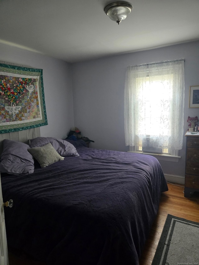 138 Harwinton Ave, Torrington, CT 06790 - bedroom with light wood-type flooring and baseboards