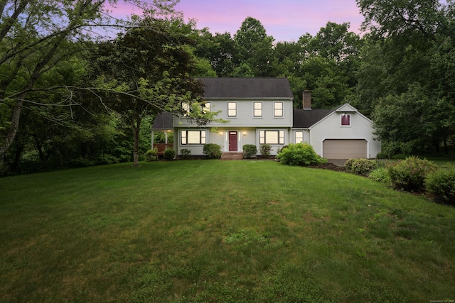 270 N Bride Brook Rd, East Lyme, CT 06333 - colonial inspired home with an attached garage, a chimney, and a front yard