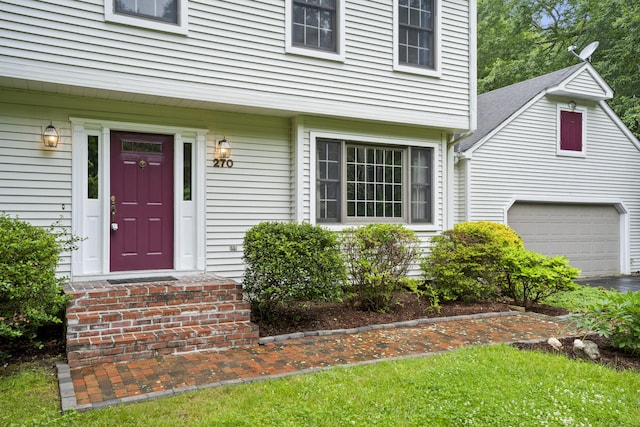 270 N Bride Brook Rd, East Lyme, CT 06333 - property entrance featuring a garage and driveway