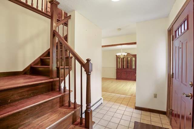 270 N Bride Brook Rd, East Lyme, CT 06333 - entrance foyer featuring stairs, a chandelier, and light tile patterned flooring