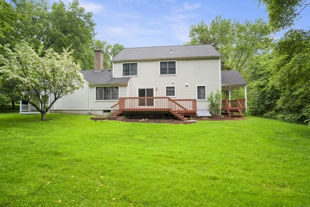 270 N Bride Brook Rd, East Lyme, CT 06333 - rear view of property with a lawn, a chimney, a deck, and roof with shingles