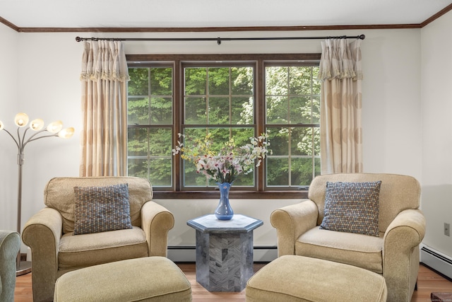 270 N Bride Brook Rd, East Lyme, CT 06333 - sitting room featuring wood finished floors, baseboard heating, and ornamental molding