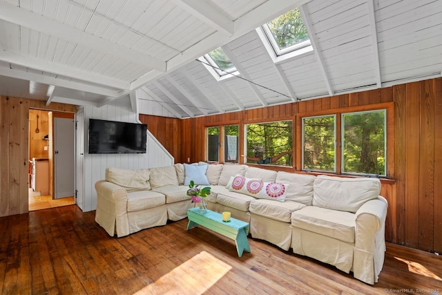 57 River Rd, Clinton, CT 06413 - living area featuring a skylight, hardwood / wood-style floors, and wood walls