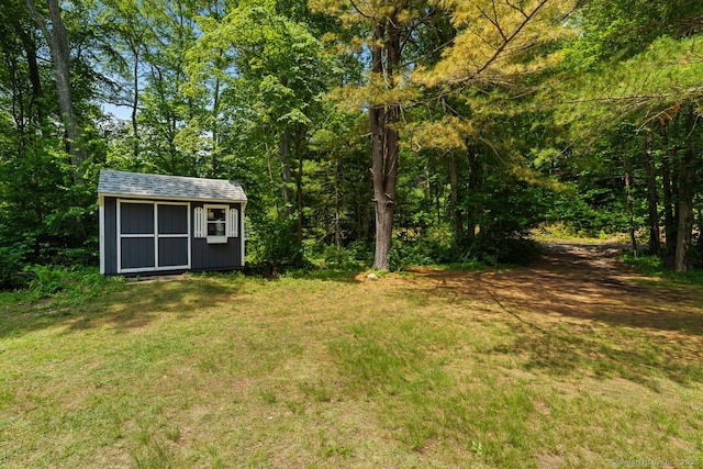 57 River Rd, Clinton, CT 06413 - view of green lawn with a storage unit