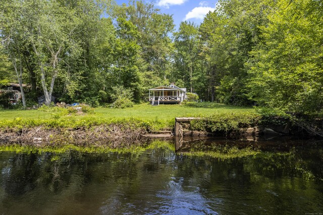 57 River Rd, Clinton, CT 06413 - dock with a water view, a lawn, and a forest view