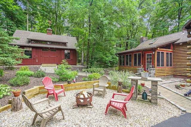 80 Jill Ln, Cheshire, CT 06410 - view of patio / terrace featuring an outdoor fire pit and a sunroom