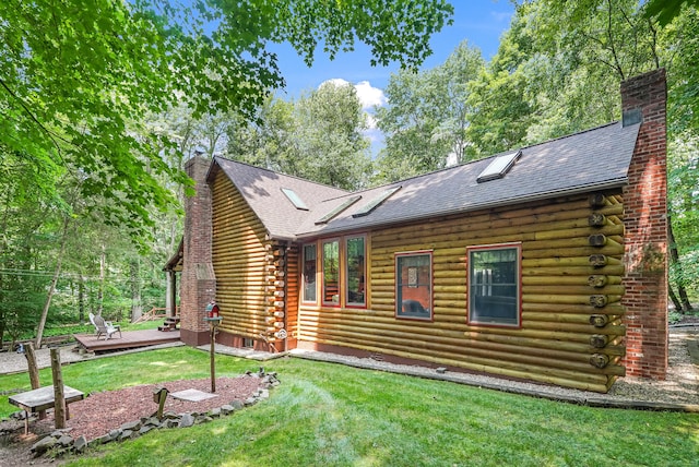 80 Jill Ln, Cheshire, CT 06410 - view of front of home featuring a chimney, log exterior, a wooden deck, a front lawn, and a shingled roof