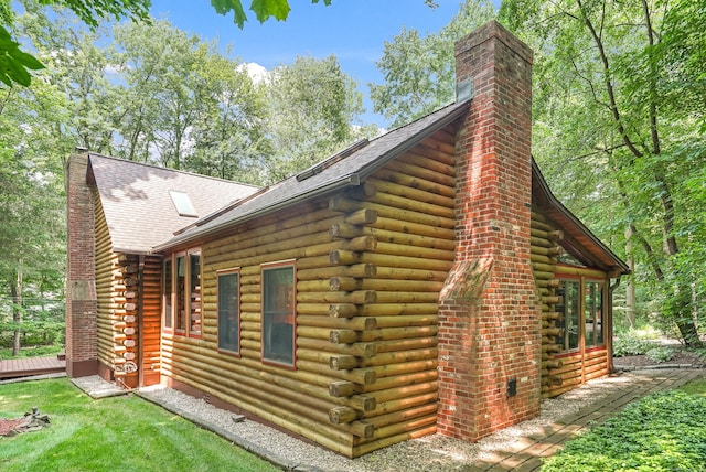 80 Jill Ln, Cheshire, CT 06410 - view of side of home with log siding, a chimney, a deck, and roof with shingles