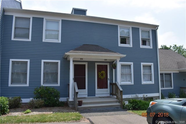 2480 Whitney Ave Unit 2, Hamden, CT 06518 - view of front of home with a chimney
