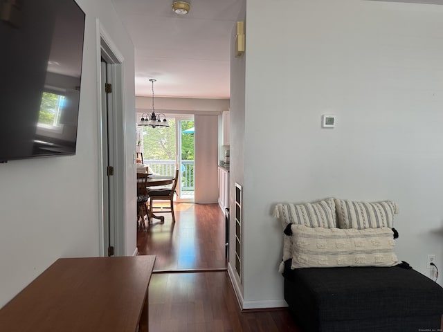 2480 Whitney Ave Unit 2, Hamden, CT 06518 - hall featuring a chandelier and dark wood-type flooring