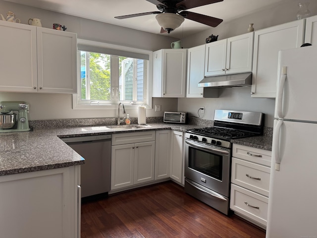 2480 Whitney Ave Unit 2, Hamden, CT 06518 - kitchen with appliances with stainless steel finishes, under cabinet range hood, white cabinets, ceiling fan, and dark wood-type flooring