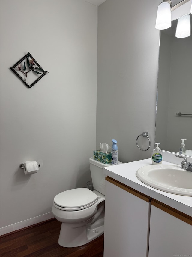 2480 Whitney Ave Unit 2, Hamden, CT 06518 - half bath featuring vanity and wood finished floors