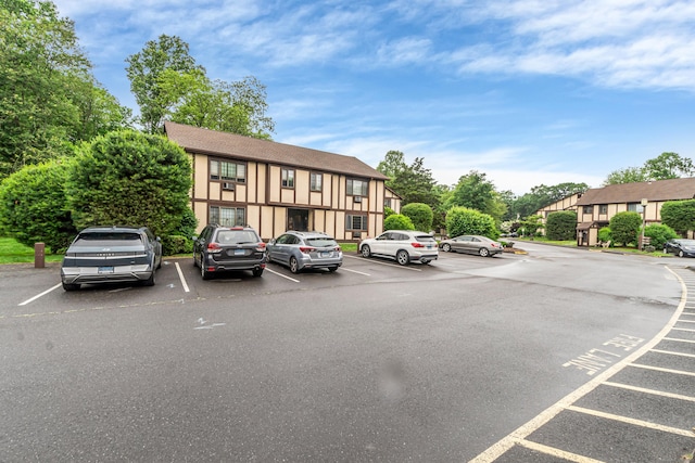 304 Foxwood Ln Unit 304, Milford, CT 06461 - view of building exterior with uncovered parking