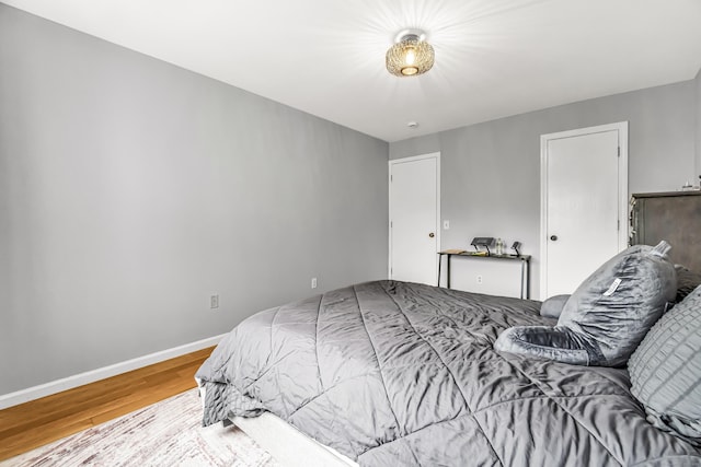 304 Foxwood Ln Unit 304, Milford, CT 06461 - bedroom with wood finished floors and baseboards