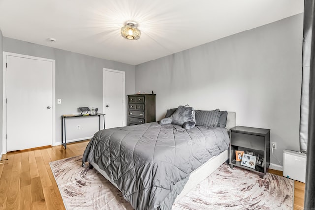 304 Foxwood Ln Unit 304, Milford, CT 06461 - bedroom featuring wood finished floors and baseboards