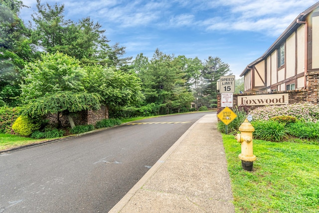 304 Foxwood Ln Unit 304, Milford, CT 06461 - view of asphalt road with traffic signs