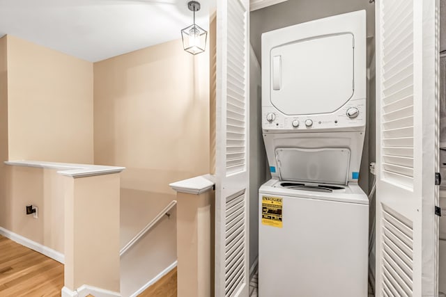 304 Foxwood Ln Unit 304, Milford, CT 06461 - laundry room with stacked washer and clothes dryer and wood finished floors