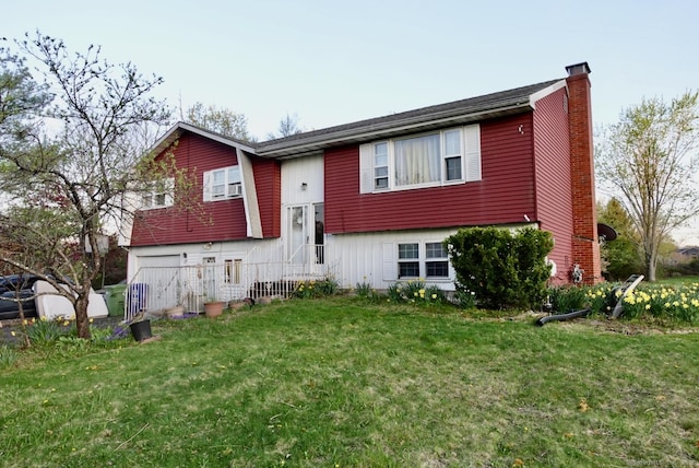 11 Kenneth Cir, Windsor, CT 06095 - bi-level home with a chimney and a front lawn