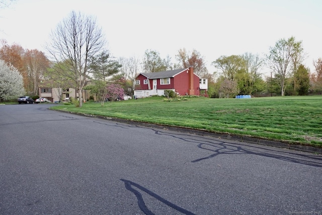 11 Kenneth Cir, Windsor, CT 06095 - view of asphalt street featuring curbs
