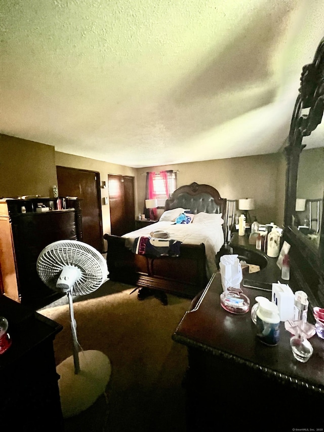 11 Kenneth Cir, Windsor, CT 06095 - bedroom with a textured ceiling and carpet floors