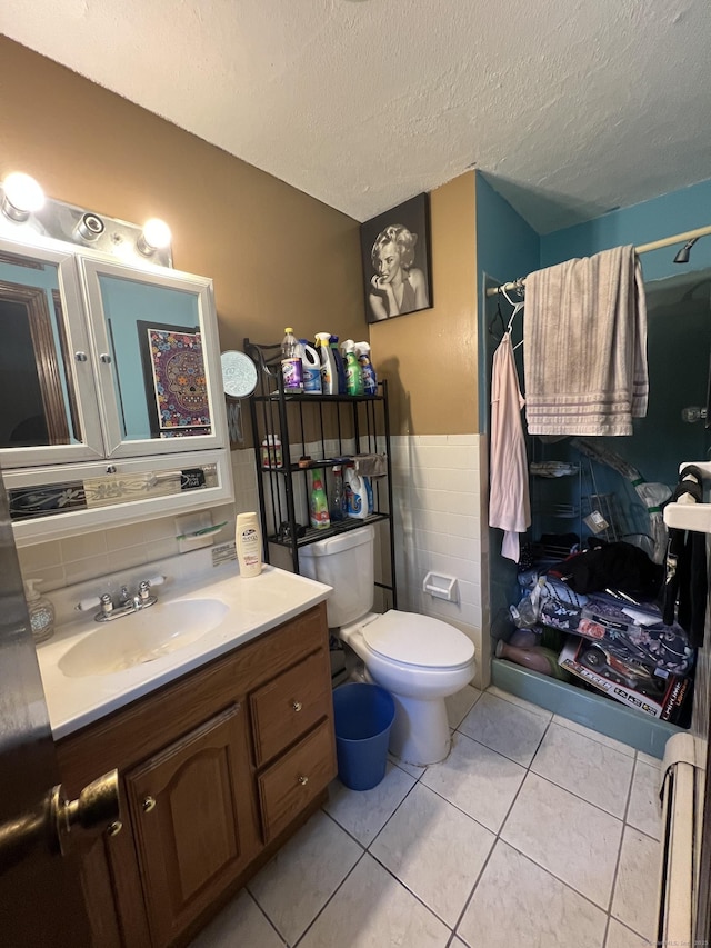 11 Kenneth Cir, Windsor, CT 06095 - full bathroom featuring tile walls, vanity, a shower with curtain, tile patterned flooring, and a wainscoted wall