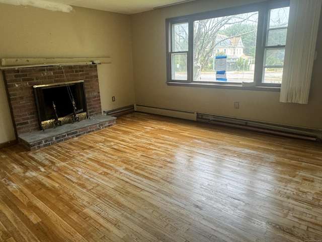 829 Windsor Ave, Windsor, CT 06095 - unfurnished living room with hardwood / wood-style floors and a fireplace
