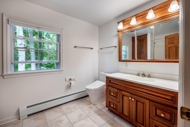 39 Aspen Mill Rd, Ridgefield, CT 06877 - bathroom with baseboard heating, vanity, and tile patterned flooring