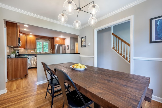 39 Aspen Mill Rd, Ridgefield, CT 06877 - dining space featuring light wood-style flooring and ornamental molding