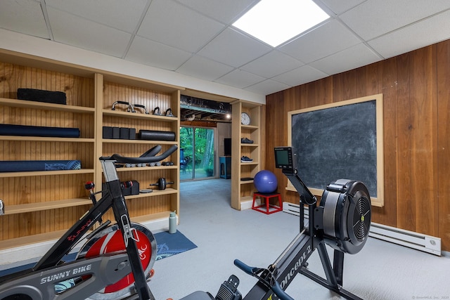 39 Aspen Mill Rd, Ridgefield, CT 06877 - workout area with wood walls, baseboard heating, and a drop ceiling