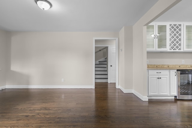 5 Skiff Pkwy, North Haven, CT 06473 - indoor dry bar featuring beverage cooler, stairway, and dark wood-type flooring