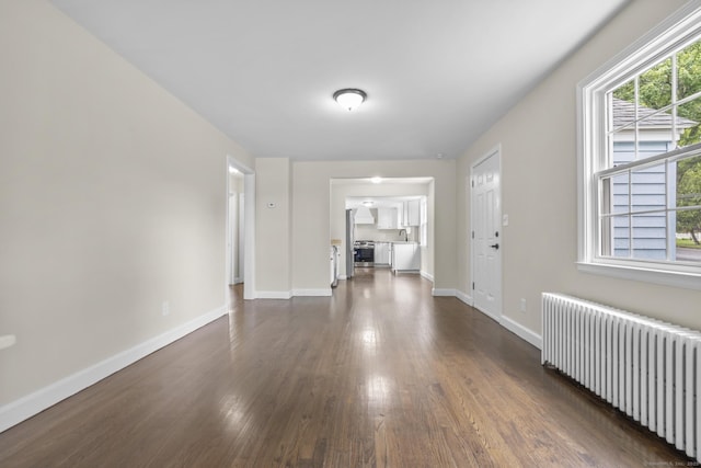 5 Skiff Pkwy, North Haven, CT 06473 - foyer featuring radiator and dark wood-style flooring