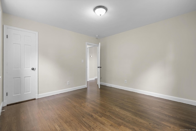 5 Skiff Pkwy, North Haven, CT 06473 - empty room featuring baseboards and dark wood-type flooring